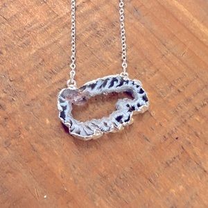 Handmade Agate slice necklace with silver plate on a plated chain.